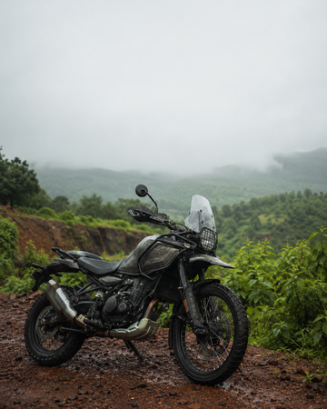 Adventure motorcycle on a wet Sahyadri gravel trail for beginner off-road riding basics