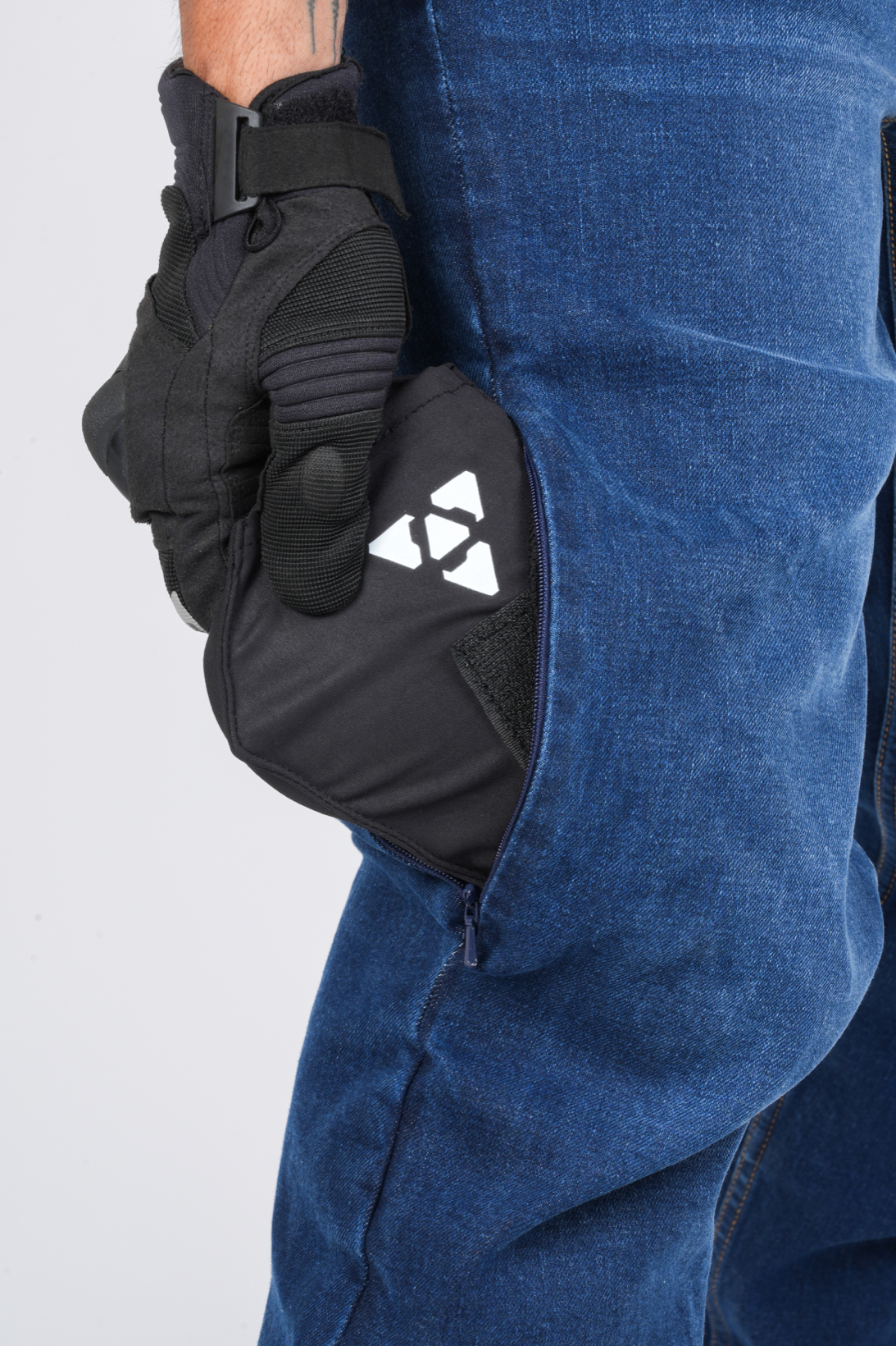 Shadow 2.0 knee armour pocket opened to show the internal pocket